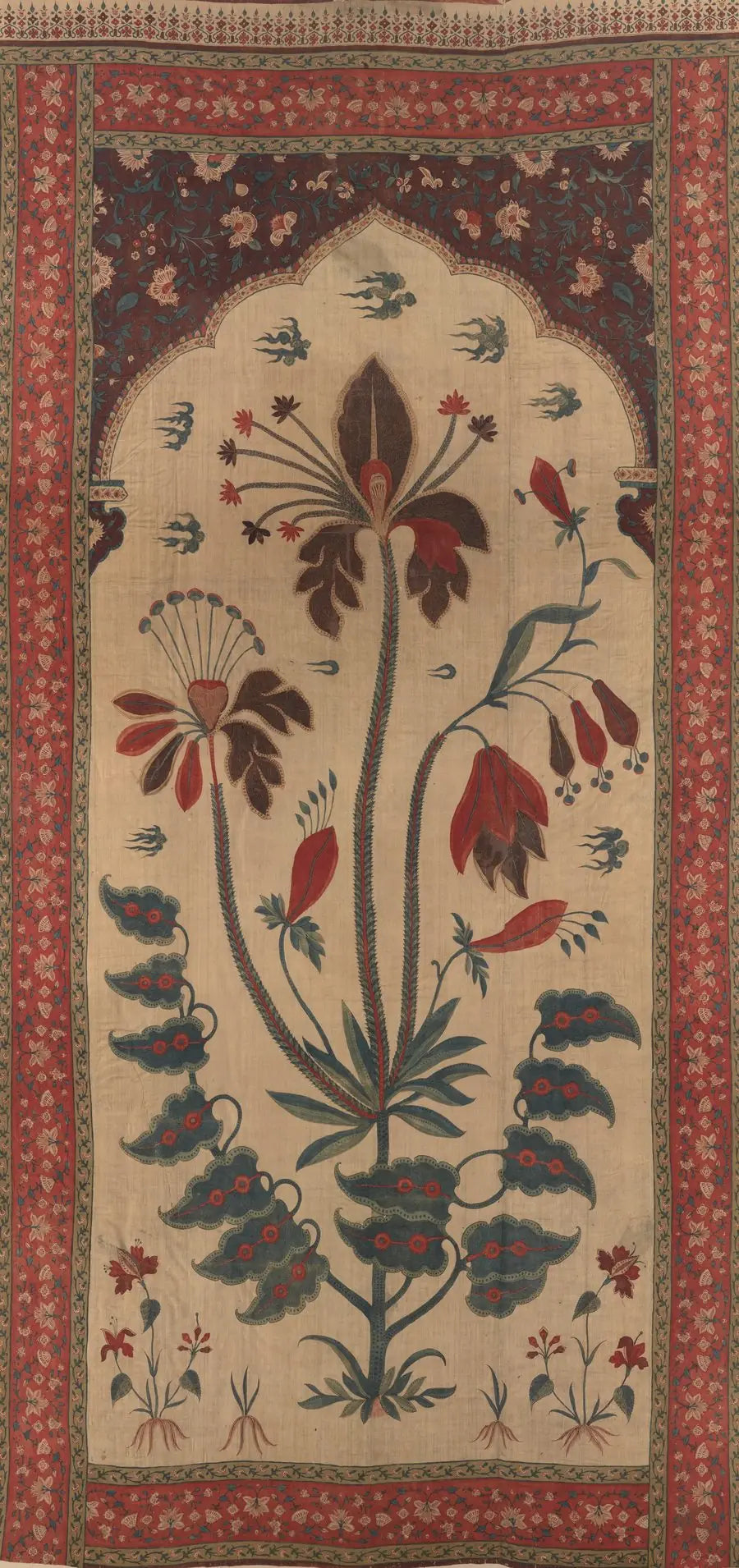 A painted cotton panel: one tall flowering plant standing inside a pointed arch, on a cream ground inside a red floral border.